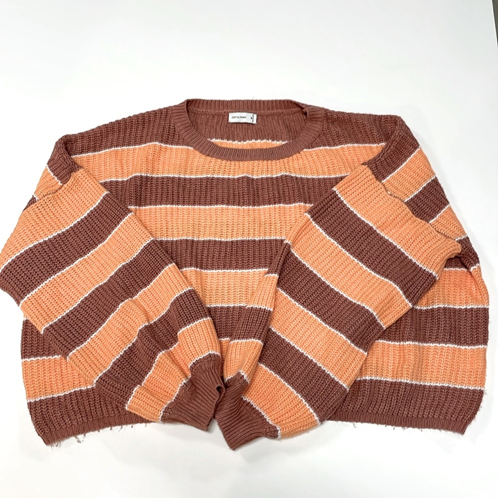 Sherbet and a fawn color striped sweater.  It’s cropped and very cute. Size M.